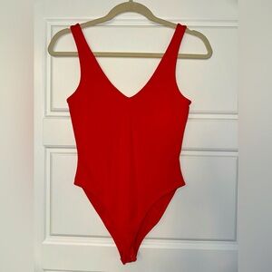 Forever 21 bodysuit, size small, color red-orange